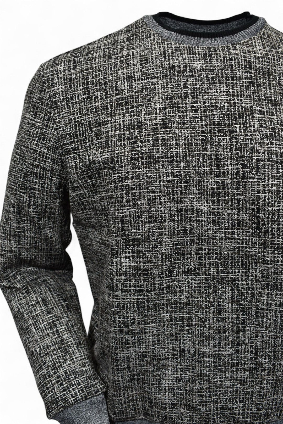 This classic crew neck sweater features a rich combination of tan, ivory, and black, making it the perfect addition to any outfit in the black or tan families. 