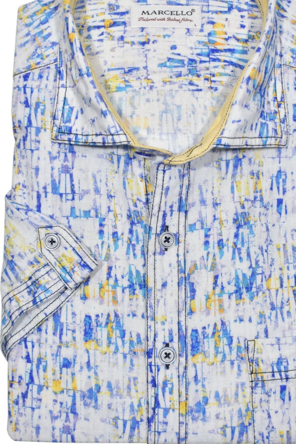 Look effortlessly stylish and sophisticated with this W826S Abstract Cotton Linen Print. Crafted with a blend of soft cotton and linen, it offers the classic linen look without the wrinkling. Featuring an abstract blue and maize pattern, it's finished with custom buttons, trim fabric and a soft trend collar for an elegant touch. Cotton linen shirt by Marcello.