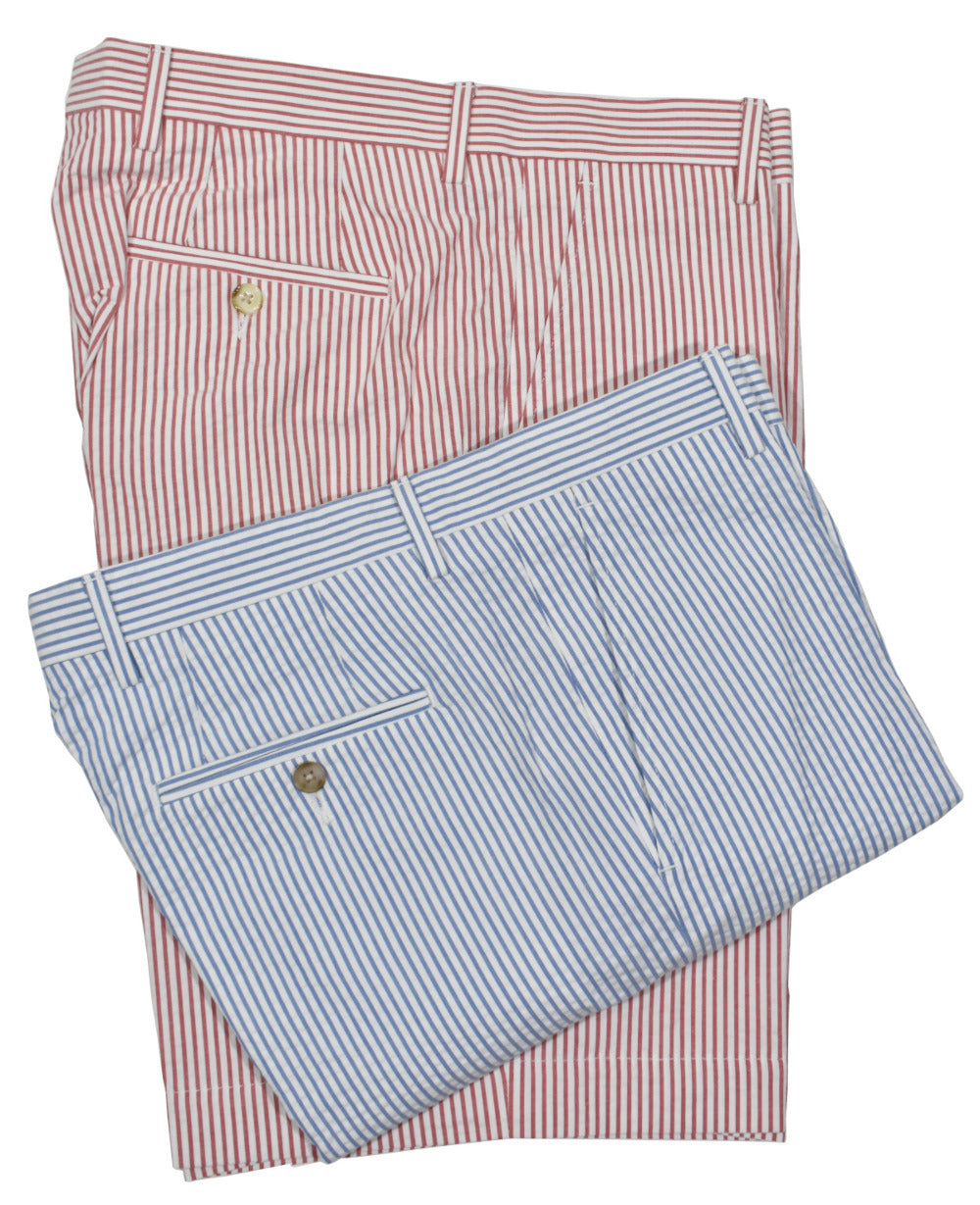 Dress up your Spring/Summer look with a classic seersucker stripe short, sure to be a nice change from your everyday solid shorts.  100% soft combed cotton for comfort and breathability.  Just above the knees length, classic pockets and classic fit.  Colors: Blue, Red