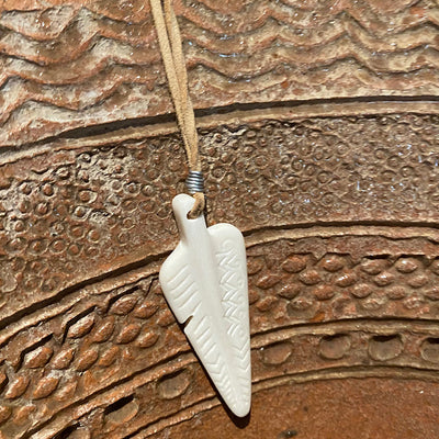 Feather Engraved Camel Bone Pendant with beige suede necklace