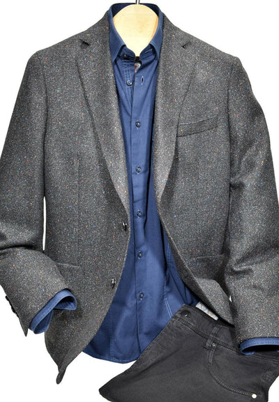 Designed by Graham, this Chiari Sport Coat from Italian fabric, features lightweight texture with unique, fine color specs. Cool and updated for a dress or fashion event, whether with pants or jeans. Wool viscose blend, classic fit.