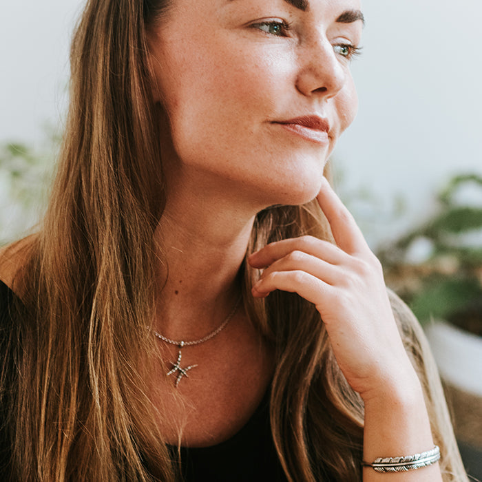 The White Feather Foundation Unisex Sterling Silver Feather wrist cuff and Pisces charm