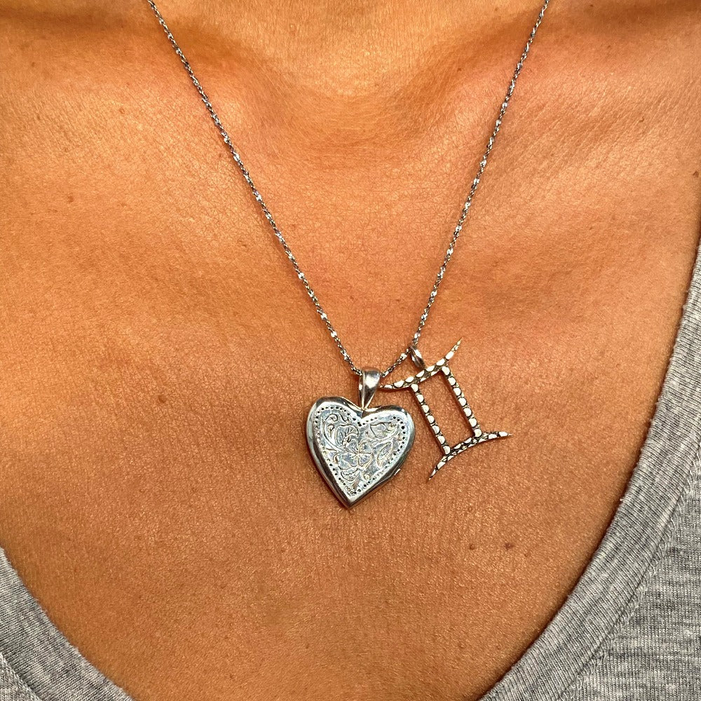 Gemini Zodiac Charm from Love Is Project with heart locket on chain