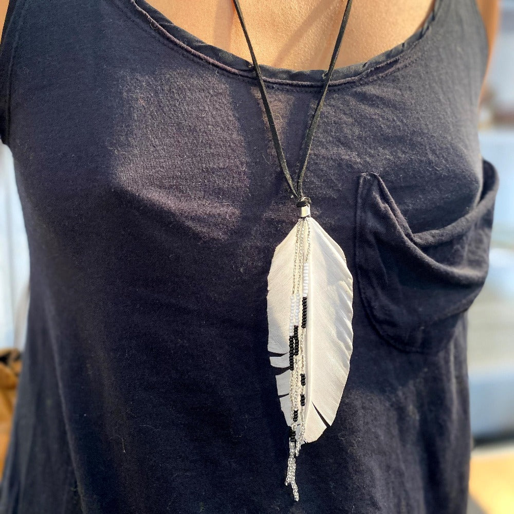 Feather Pendant Necklace with black suede necklace and black and white beads